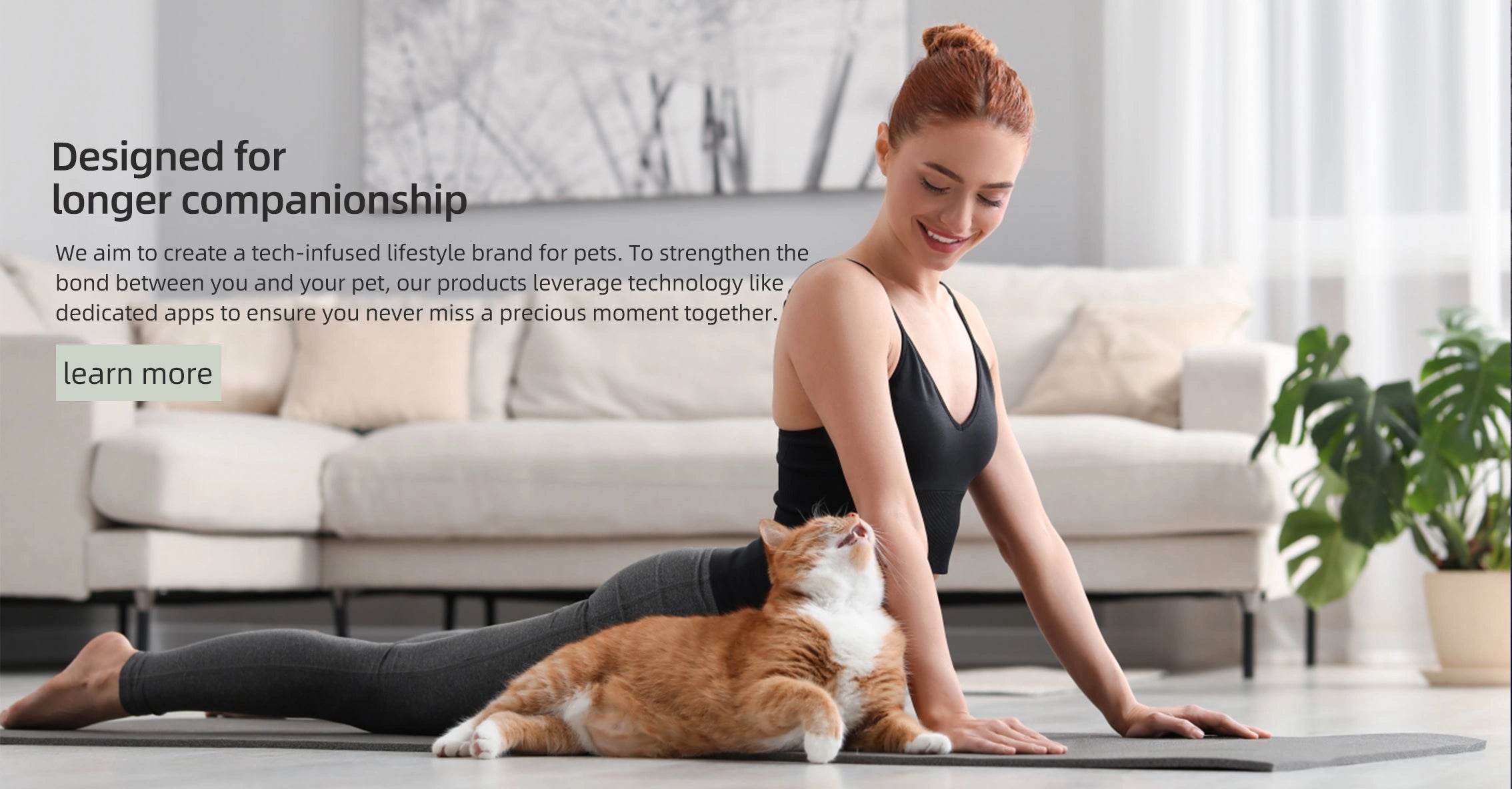 Learn more about our tech-infused lifestyle brand for pets — woman sitting on a couch with a cat.slider_item_T9t6zH