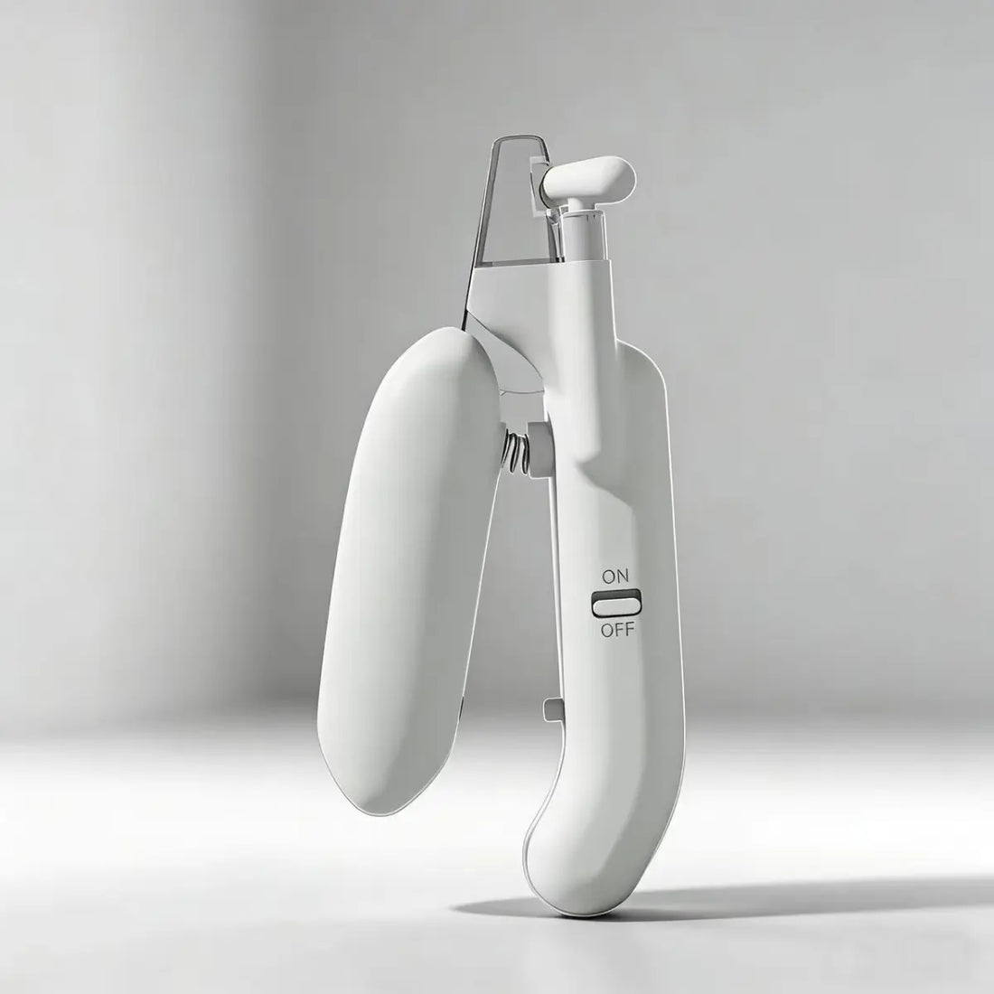 Single product photo of cat nail clipper with ON/OFF LED light switch and transparent guard.