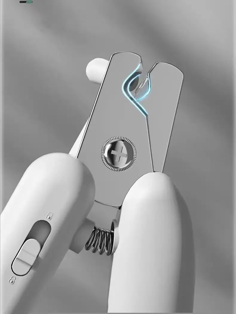 Close-up of curved cutting blade on cat nail clippers for precise trimming.