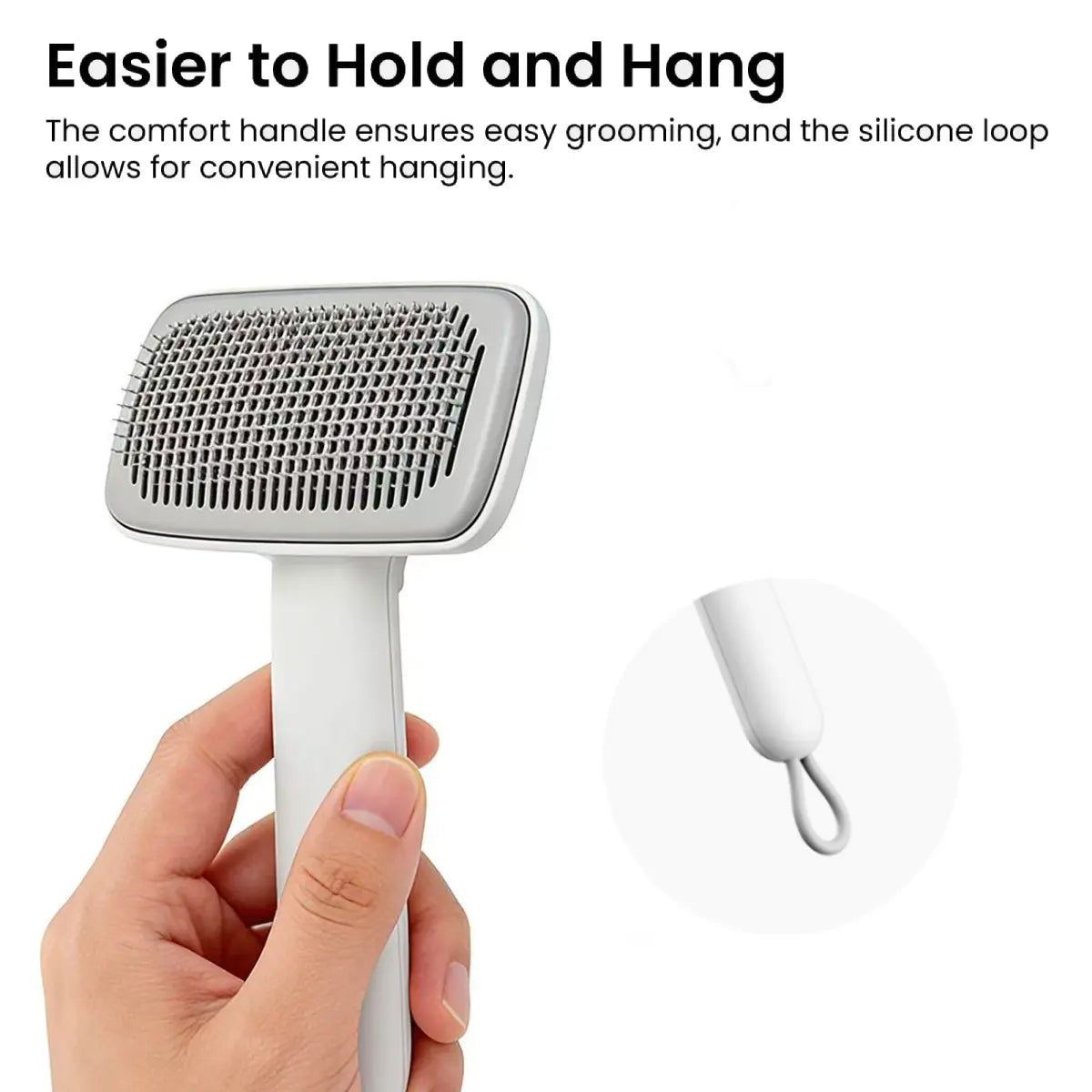 Lightweight cat grooming brush with comfortable non-slip handle and hanging loop for easy storage