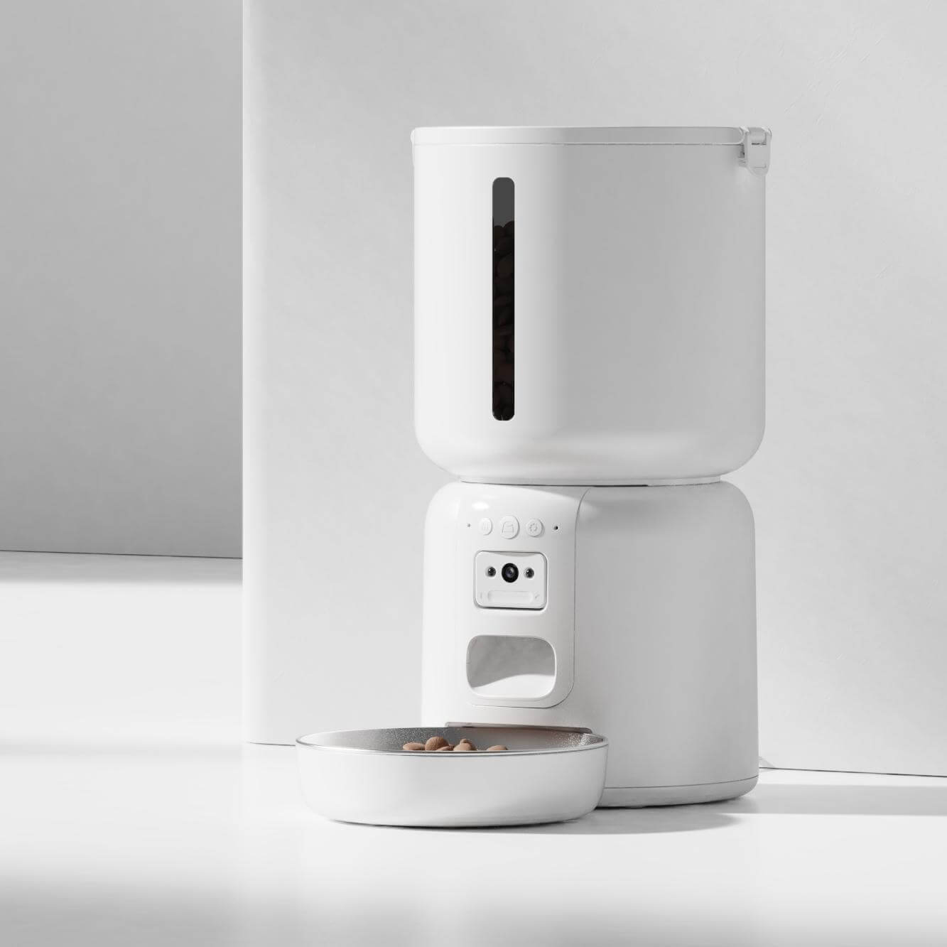 The white smart cat feeder against a pure white background